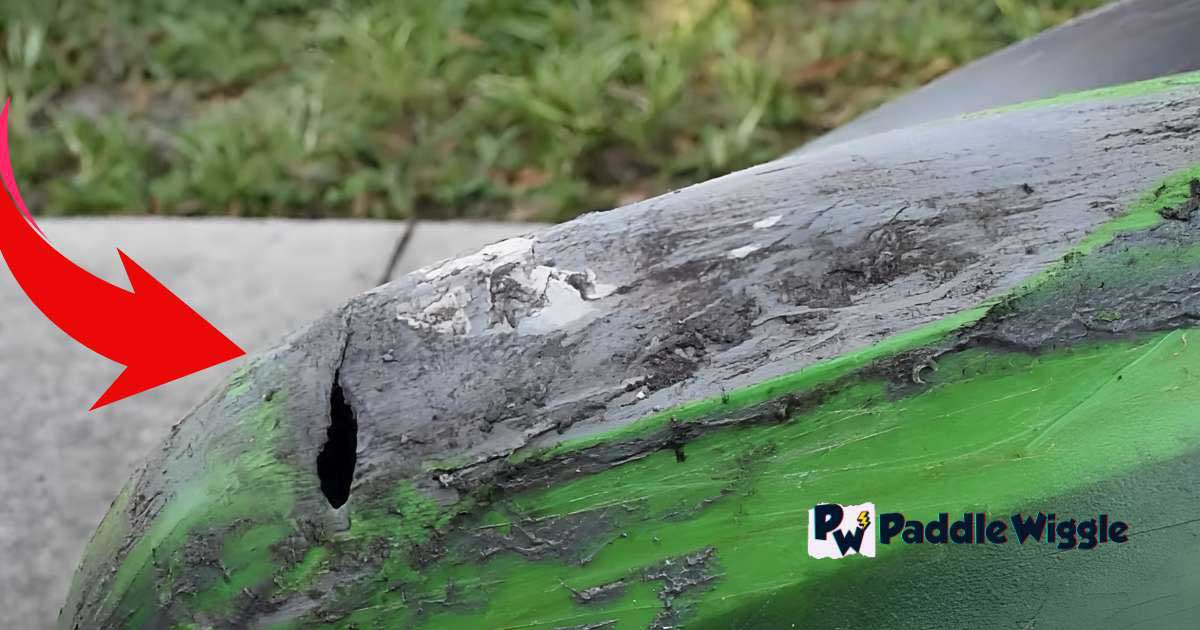 A damaged hull of a hard-shell kayak that lead to sinking a kayak.
