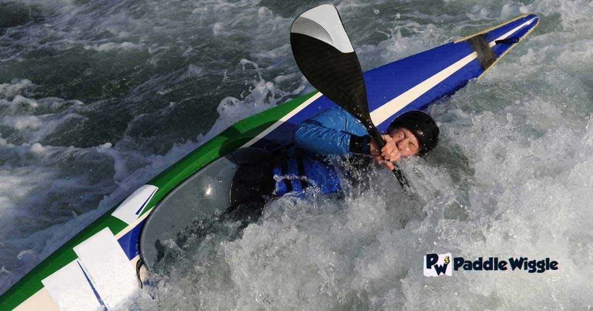 A capsizing kayak.