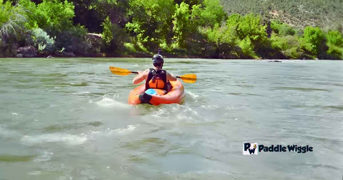 Whitewater kayaking with an inflatable kayak.