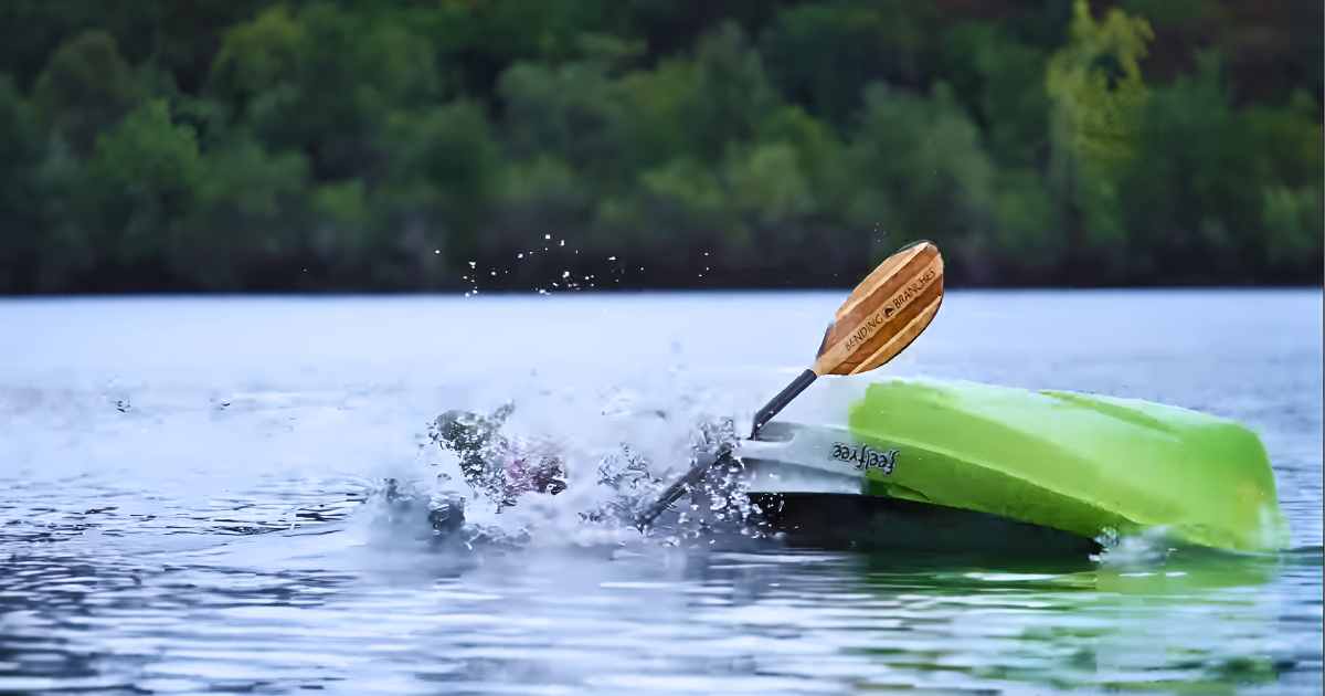 A flipped kayak leading to potential injuries.