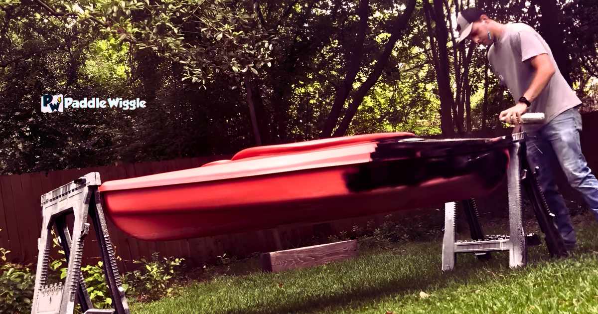 Spray painting a kayak